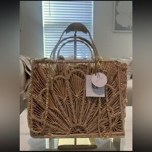 House of Harlow 1960 hand-woven raffia handbag with a gold crossbody strap